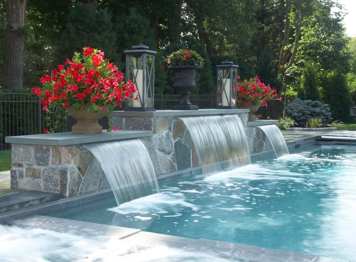 Designing a swimming pool with a waterfall and spa features